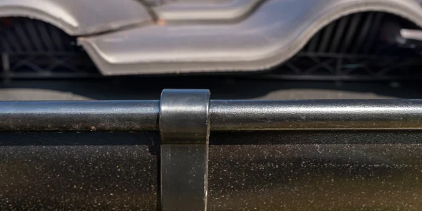 close-up-of-roof-tiles-and-gutter-system-2026-03-24-09-00-40-utc-grande